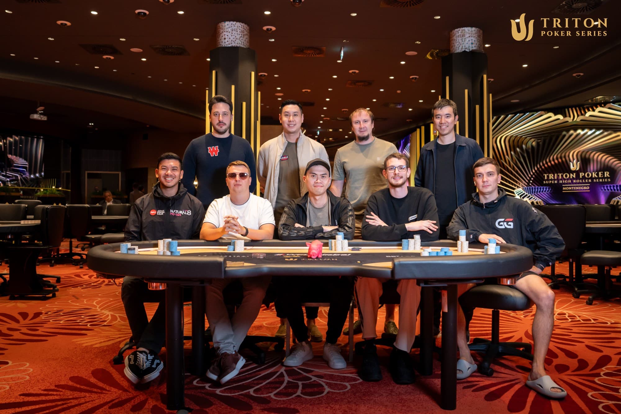 Triton Montenegro Event 7 final table players (clockwise from back left): Adrian Mateos, Punnat Punsri, Maksim Shornikau, Stanley Tang, Aleksandr Zubov, Tomas Santerne, Kiat Lee, Aleks Ponakovs, Michael Soyza.