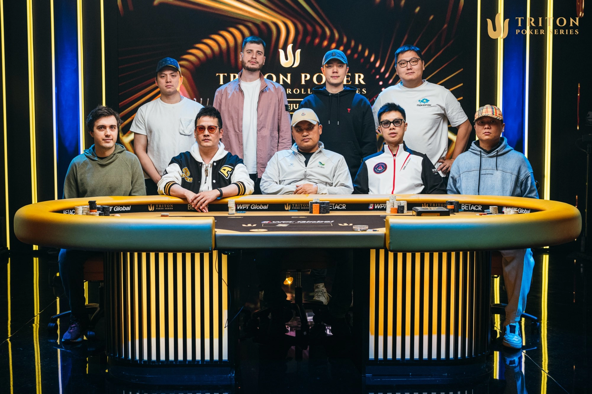 Event 1 final table players (clockwise from back left): Michael Jozoff, Nikita Kuznetcov, Zhen Chen, Damir Zhugralin, Yuzhu Wang, Weiran Pu, Zhao Hongjun, Chen Dong, Paulius Plausinaitis