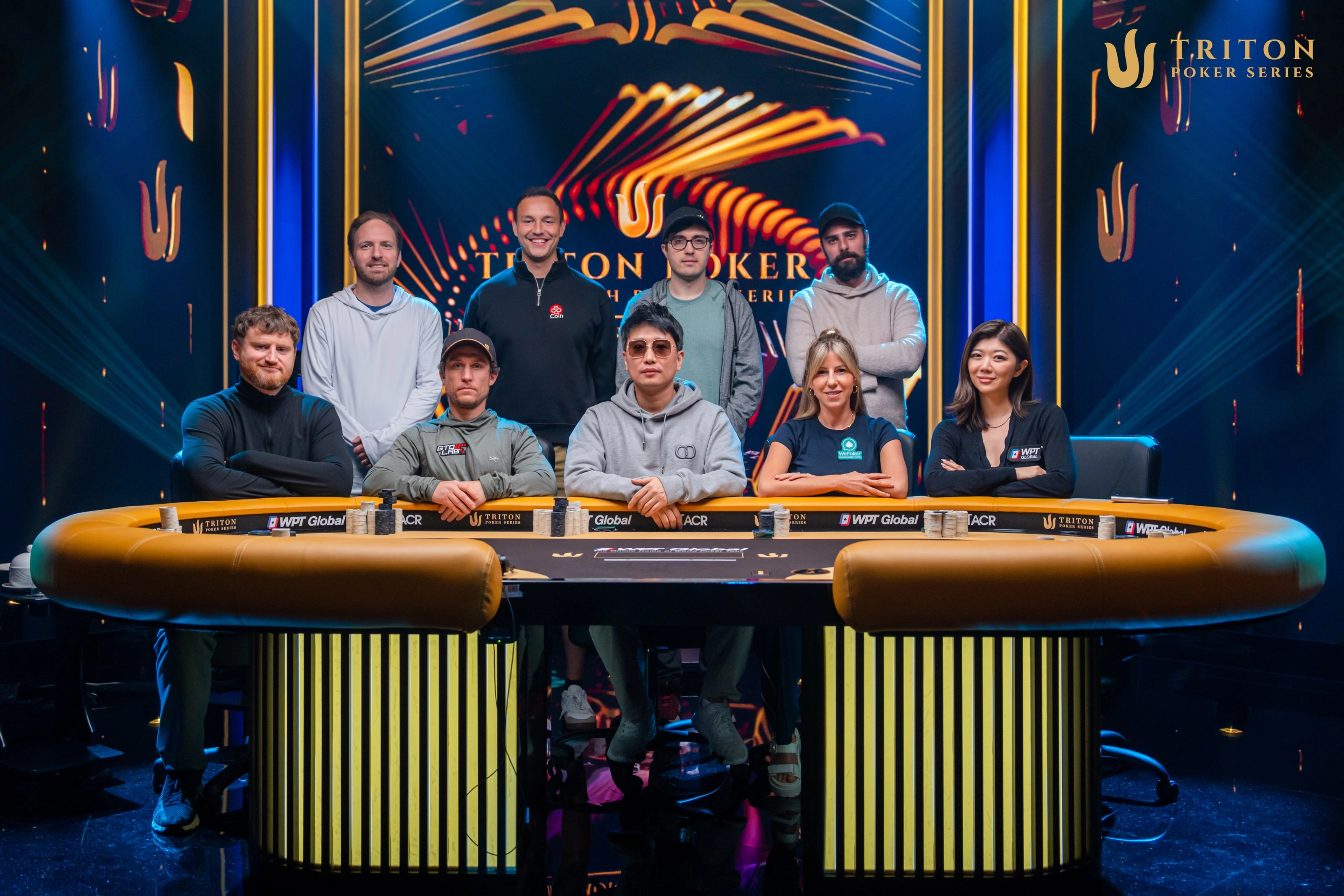 Triton Montengro Event 1 final table players (clockwise from back left): Mike Watson, Tom Fuchs, Paulius Plausinaitis, Theodore McQuilkin, Xuan Liu, Kristen Foxen, Zhang Yu, Dan Dvoress, David Peters
