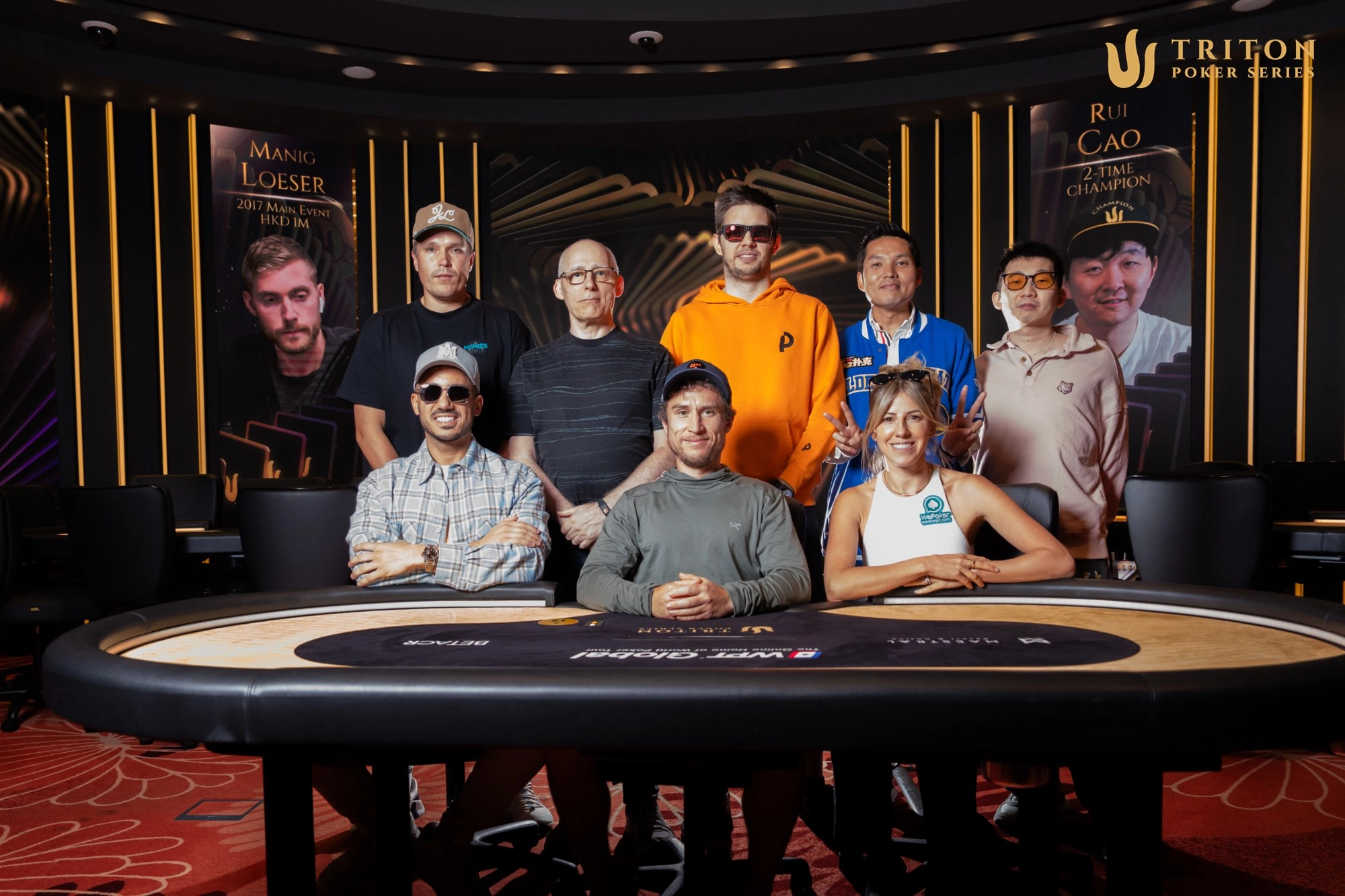 Triton Montenegro Event 11 final table players (clockwise from back left): Eelis Parssinen, Talal Shakerchi, Matthias Eibinger, Ren Lin, Wang Ye, Kristen Foxen, Dan Dvoress, Jamil Wakil