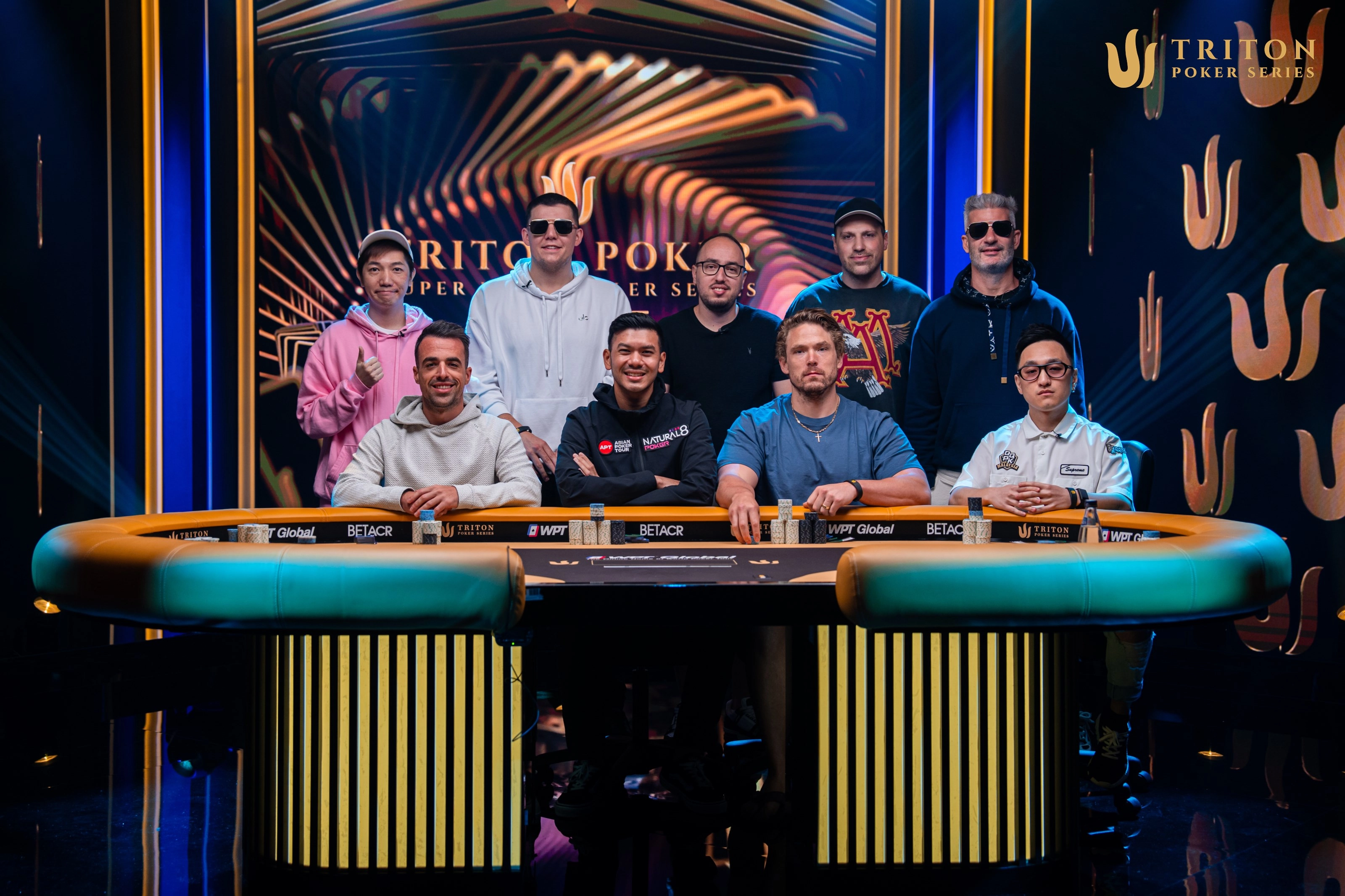 Triton Montenegro Event #2 final table players (clockwise from back left): Tom Heung, Jesse Lonis, Barak Wisbrod, Artur Martirosian, Nacho Barbero, Webster Lim, Alex Foxen, Michael Soyza, Raul Manzanares