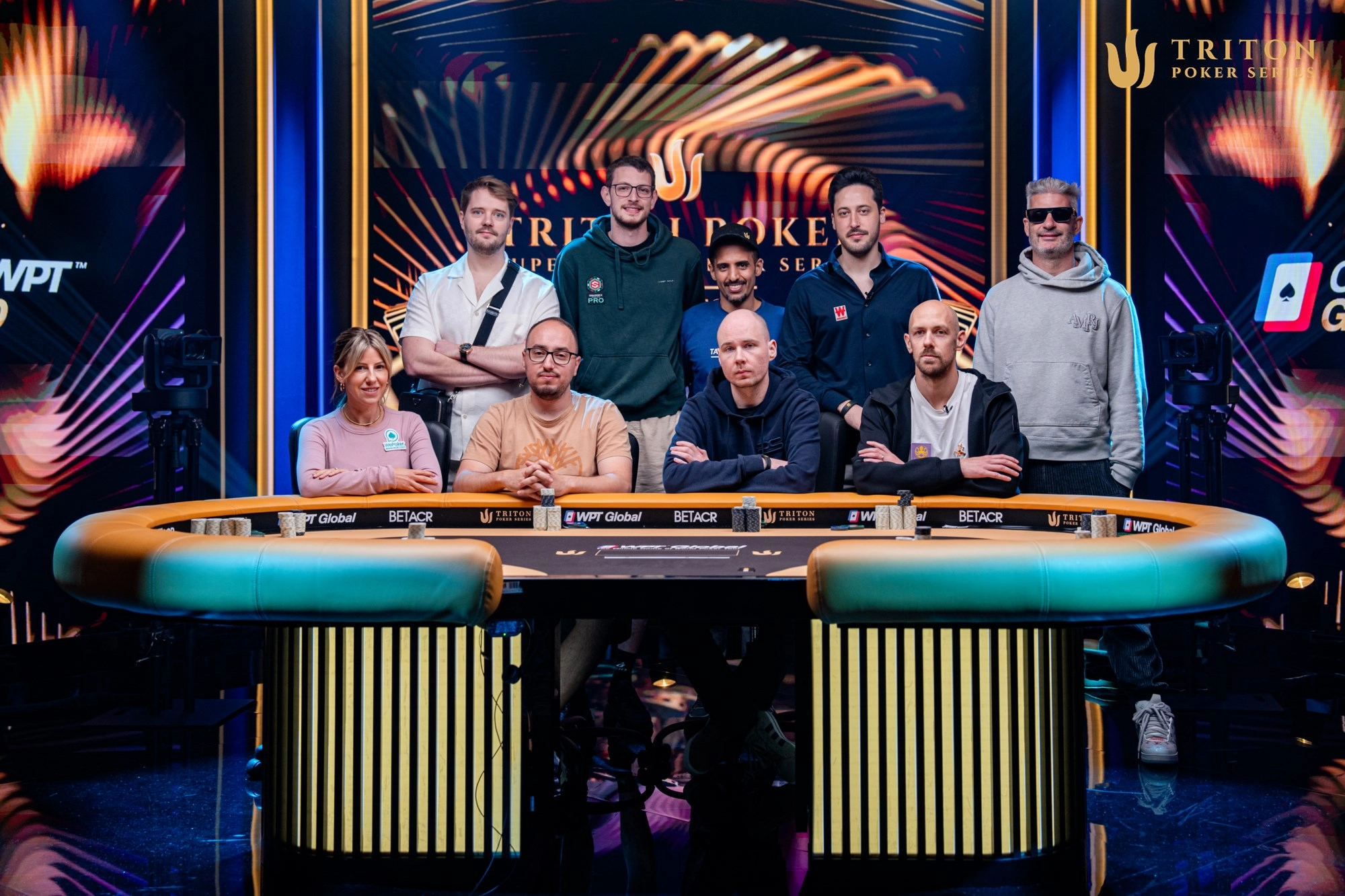 Triton Montenegro Event #3 final table players (clockwise from back left): Linus Loeliger, Thomas Santerne, Abdullah Alajmi, Adrian Mateos, Nacho Barbero, Stephen Chidwick, Tobias Schwecht, Barak Wisbrod, Kristen Foxen